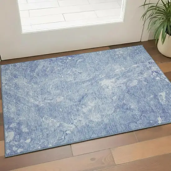 Sky Blue And Ivory Abstract Washable Area Rug With UV Protection Photo 1
