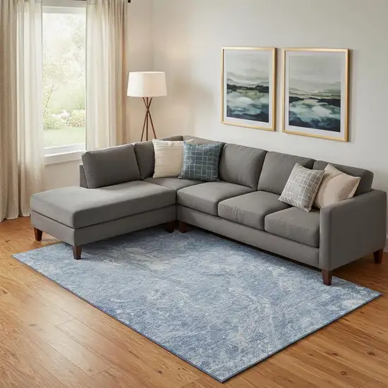 Sky Blue And Ivory Abstract Washable Area Rug With UV Protection Photo 1