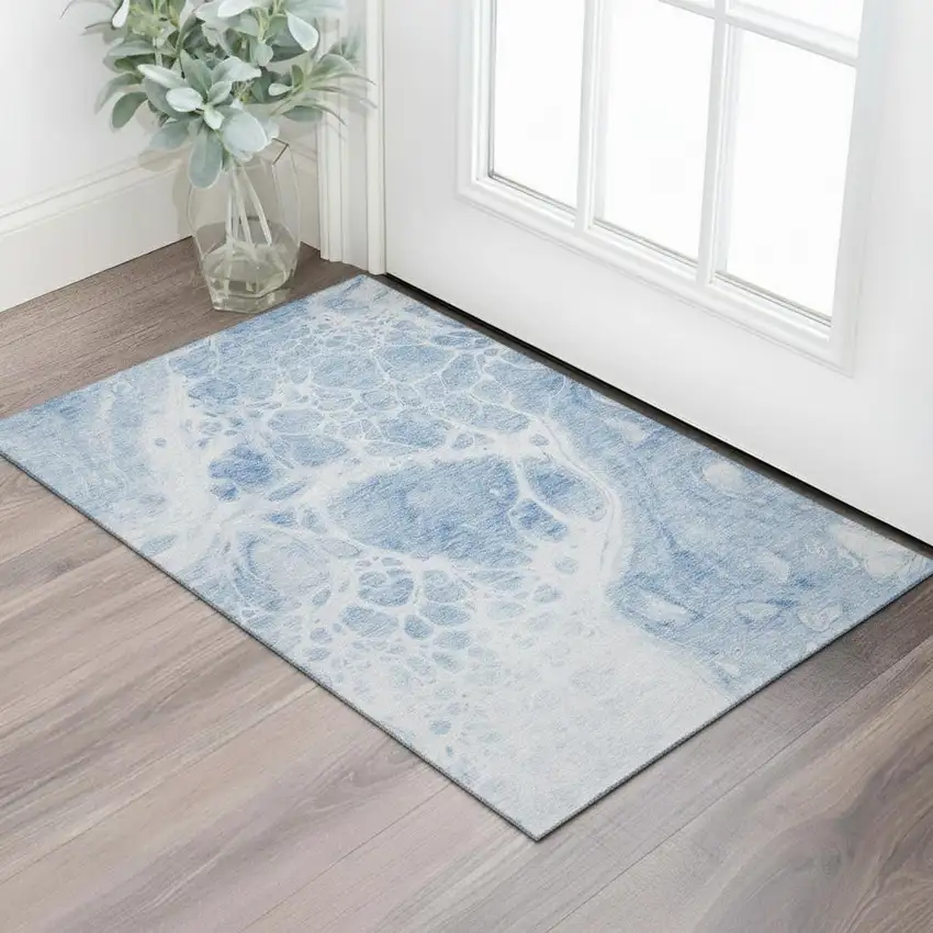 Sky Blue And Ivory Abstract Washable Area Rug With UV Protection Photo 1