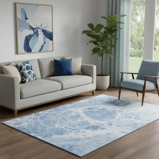 Sky Blue And Ivory Abstract Washable Area Rug With UV Protection Photo 1