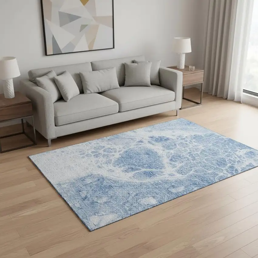 Sky Blue And Ivory Abstract Washable Area Rug With UV Protection Photo 1