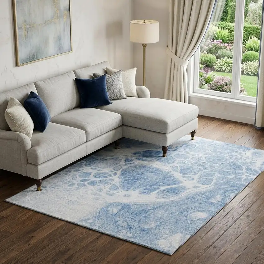 Sky Blue And Ivory Abstract Washable Area Rug With UV Protection Photo 1