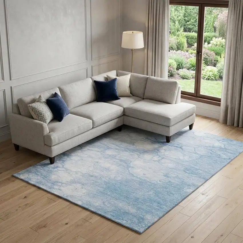 Sky Blue And Ivory Abstract Washable Area Rug With UV Protection Photo 1