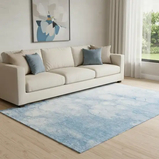 Sky Blue And Ivory Abstract Washable Area Rug With UV Protection Photo 1