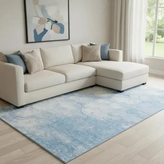 Sky Blue And Ivory Abstract Washable Area Rug With UV Protection Photo 1