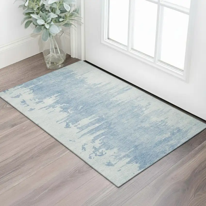 Sky Blue And Ivory Abstract Washable Area Rug With UV Protection Photo 1