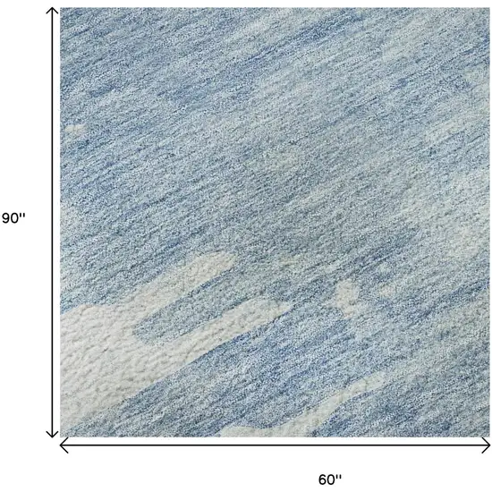 Sky Blue And Ivory Abstract Washable Area Rug With UV Protection Photo 9