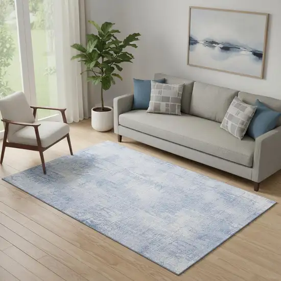 Sky Blue And Ivory Abstract Washable Area Rug With UV Protection Photo 1