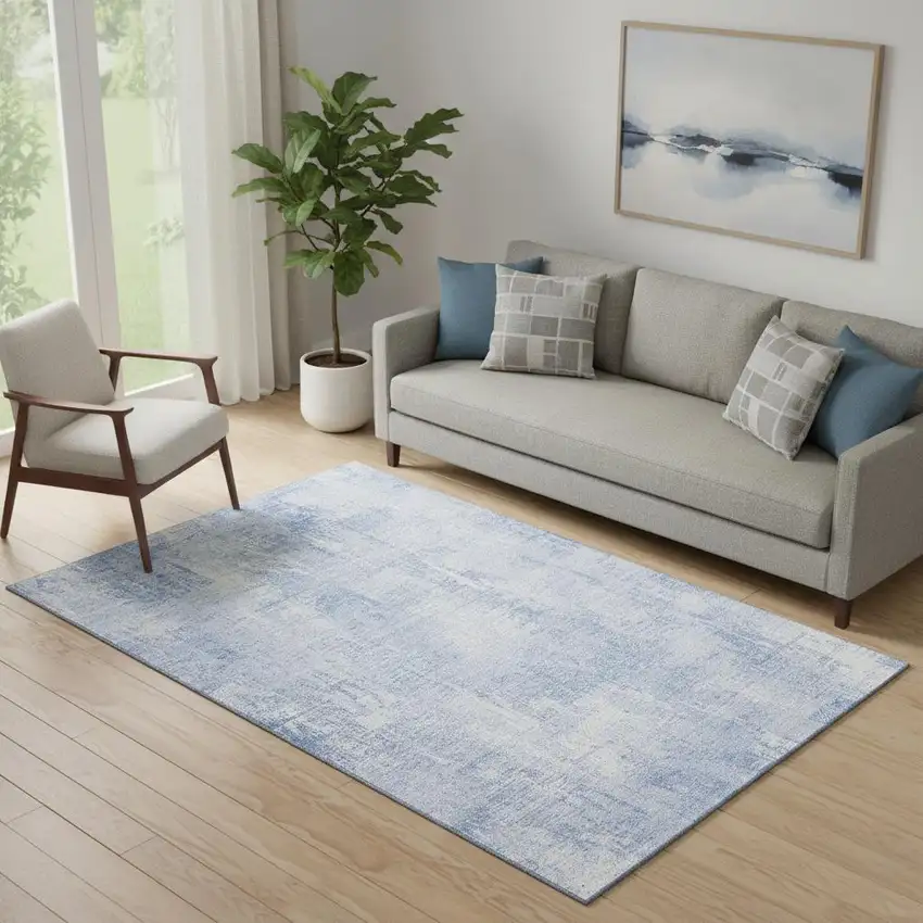 Sky Blue And Ivory Abstract Washable Area Rug With UV Protection Photo 1