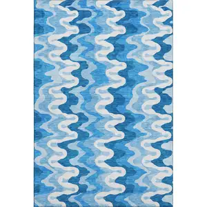 Photo of Sky Blue And Ivory Abstract Washable Area Rug With UV Protection