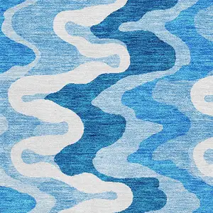 Photo of Sky Blue And Ivory Abstract Washable Area Rug With UV Protection