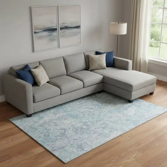 Sky Blue And Ivory Abstract Washable Area Rug With UV Protection Photo 1