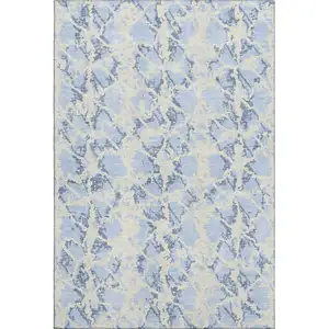 Photo of Sky Blue And Ivory Abstract Washable Area Rug With UV Protection