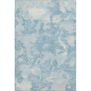 Photo of Sky Blue And Ivory Abstract Washable Area Rug With UV Protection