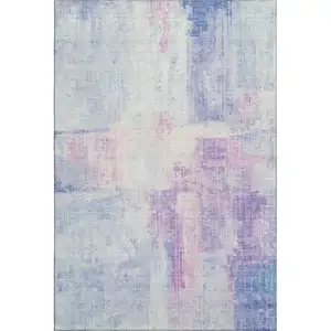 Photo of Sky Blue And Ivory Abstract Washable Area Rug With UV Protection
