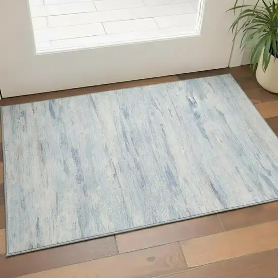 Sky Blue And Ivory Abstract Washable Area Rug With UV Protection Photo 2