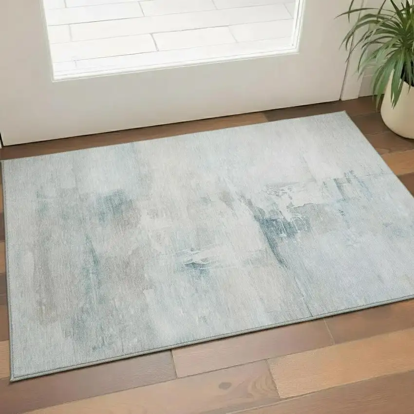 Sky Blue And Ivory Abstract Washable Area Rug With UV Protection Photo 2
