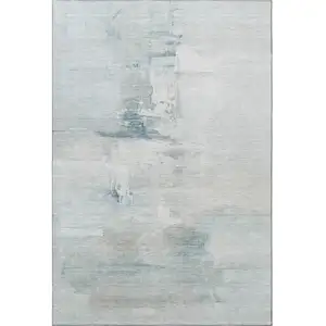 Photo of Sky Blue And Ivory Abstract Washable Area Rug With UV Protection