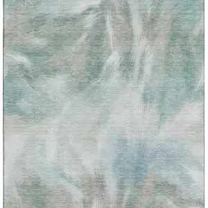 Photo of Sky Blue And Ivory Abstract Washable Area Rug With UV Protection