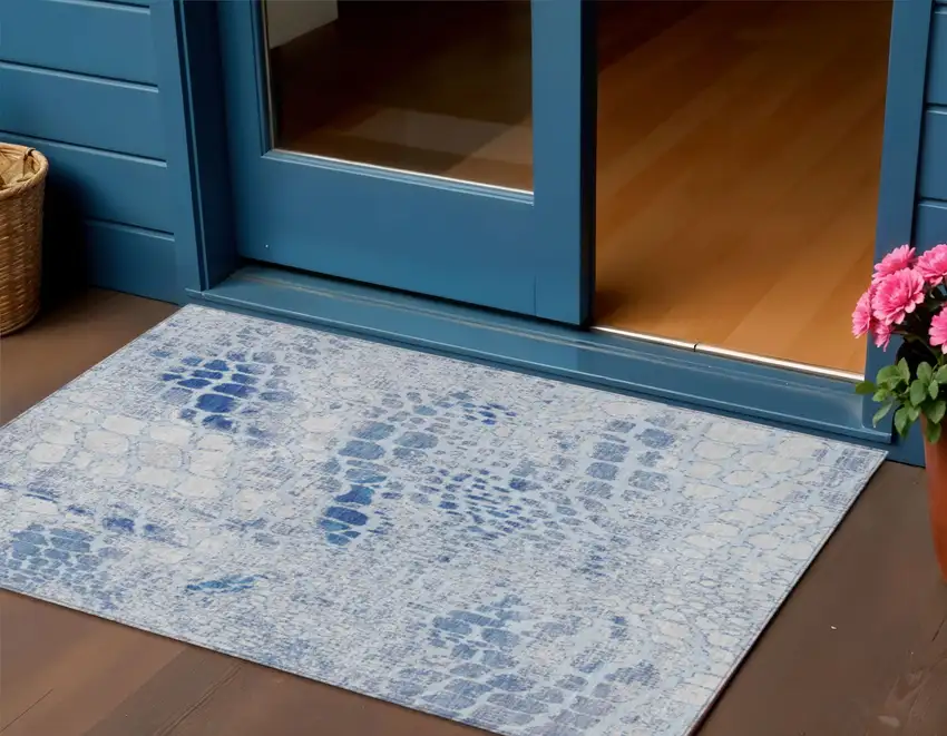 Sky Blue And Ivory Abstract Washable Indoor Outdoor Area Rug Photo 1