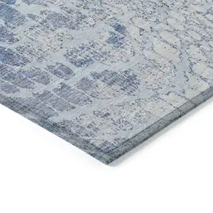 Photo of Sky Blue And Ivory Abstract Washable Indoor Outdoor Area Rug