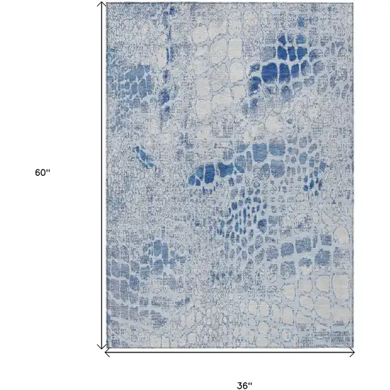 Sky Blue And Ivory Abstract Washable Indoor Outdoor Area Rug Photo 3