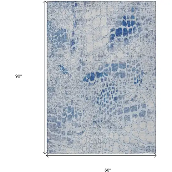Sky Blue And Ivory Abstract Washable Indoor Outdoor Area Rug Photo 3