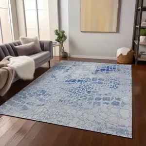 Photo of Sky Blue And Ivory Abstract Washable Indoor Outdoor Area Rug