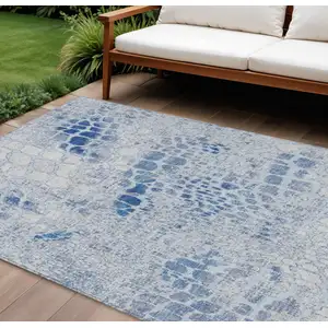 Photo of Sky Blue And Ivory Abstract Washable Indoor Outdoor Area Rug