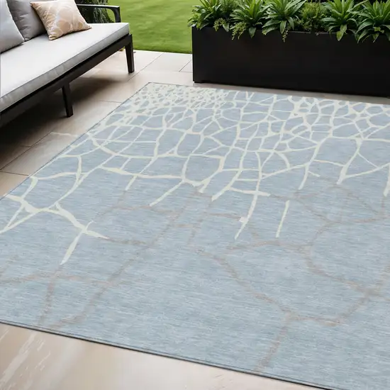 Sky Blue And Ivory Abstract Washable Indoor Outdoor Area Rug Photo 1