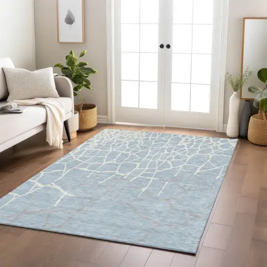 Sky Blue And Ivory Abstract Washable Indoor Outdoor Area Rug Photo 9