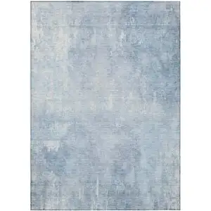 Photo of Sky Blue And Ivory Abstract Washable Indoor Outdoor Area Rug