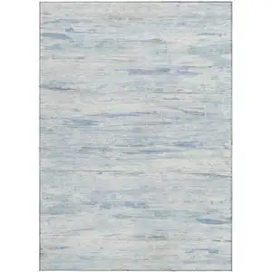 Photo of Sky Blue And Ivory Abstract Washable Indoor Outdoor Area Rug