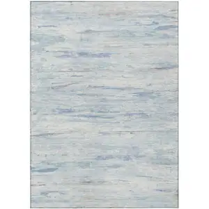 Photo of Sky Blue And Ivory Abstract Washable Indoor Outdoor Area Rug