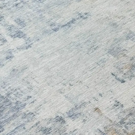 Sky Blue And Ivory Abstract Washable Indoor Outdoor Area Rug Photo 1