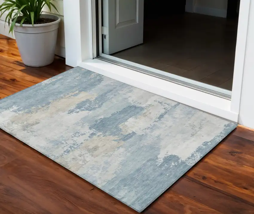 Sky Blue And Ivory Abstract Washable Indoor Outdoor Area Rug Photo 1