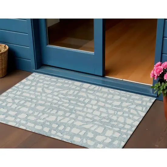 Sky Blue And Ivory Abstract Washable Indoor Outdoor Area Rug Photo 1