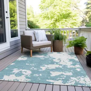 Photo of Sky Blue And Ivory Abstract Washable Indoor Outdoor Area Rug