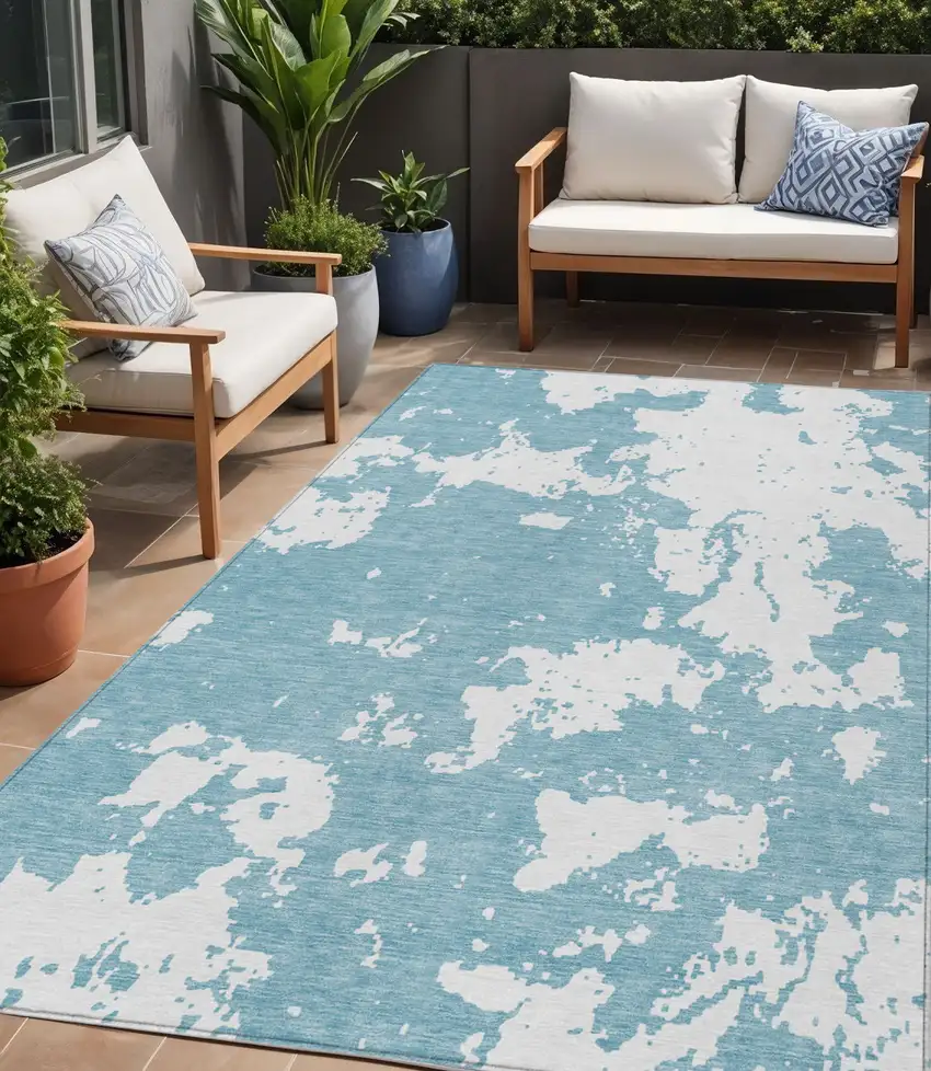 Sky Blue And Ivory Abstract Washable Indoor Outdoor Area Rug Photo 1
