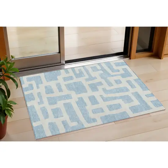 Sky Blue And Ivory Abstract Washable Indoor Outdoor Area Rug Photo 1