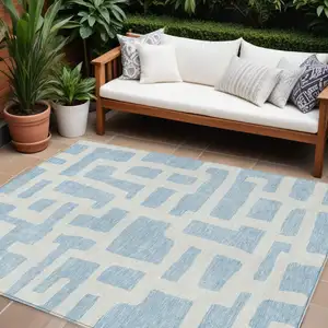 Photo of Sky Blue And Ivory Abstract Washable Indoor Outdoor Area Rug