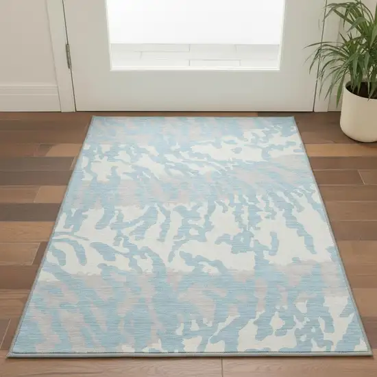Sky Blue And Ivory Animal Print Washable Area Rug With UV Protection Photo 2