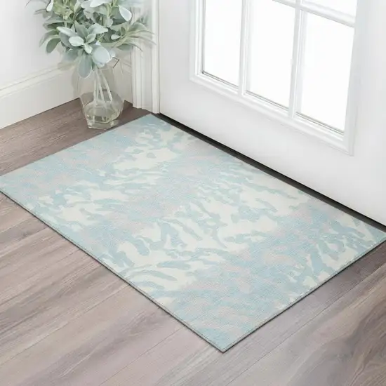 Sky Blue And Ivory Animal Print Washable Area Rug With UV Protection Photo 1