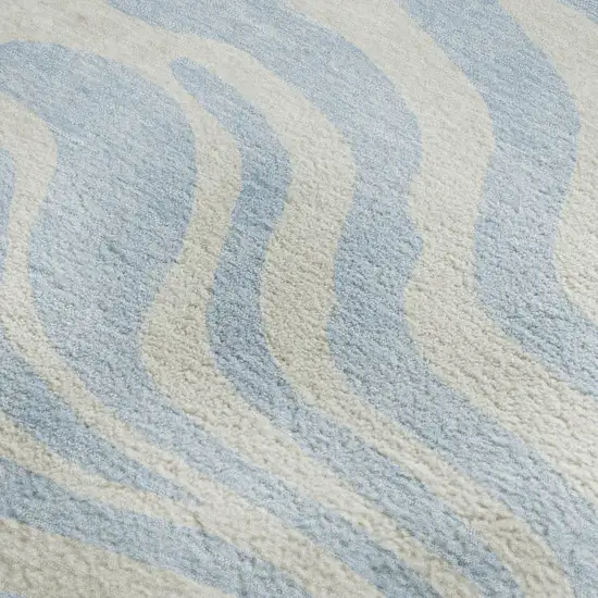 Sky Blue And Ivory Animal Print Washable Area Rug With UV Protection Photo 2