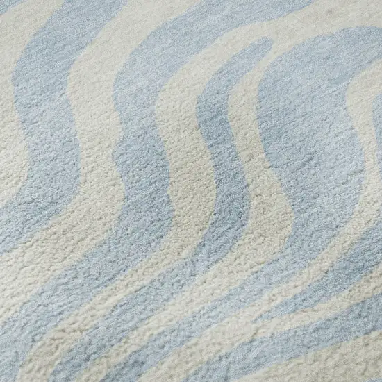 Sky Blue And Ivory Animal Print Washable Area Rug With UV Protection Photo 1