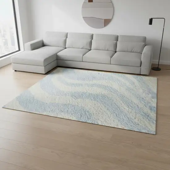 Sky Blue And Ivory Animal Print Washable Area Rug With UV Protection Photo 2