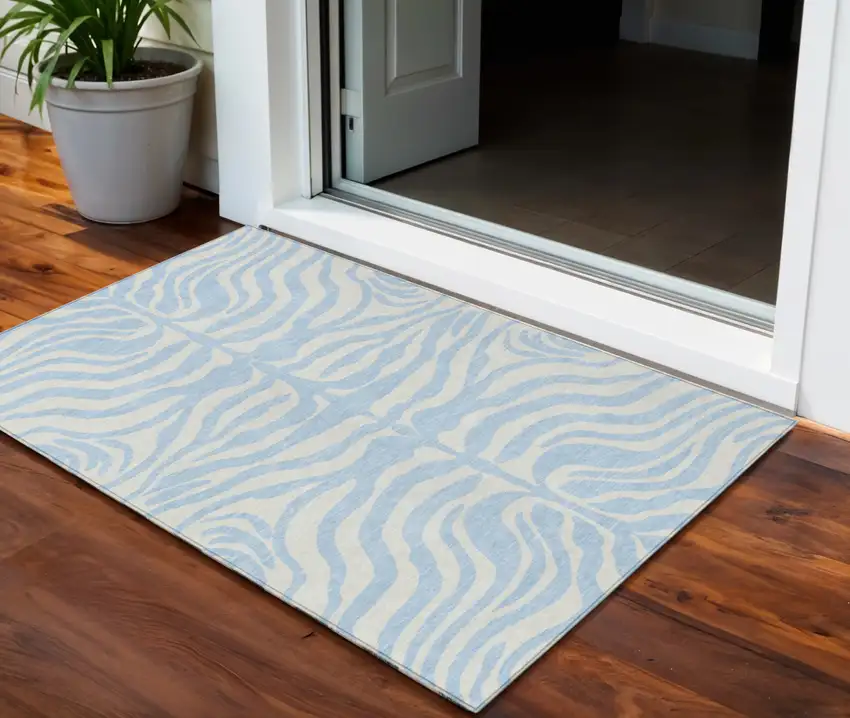 Sky Blue And Ivory Animal Print Washable Indoor Outdoor Area Rug Photo 1