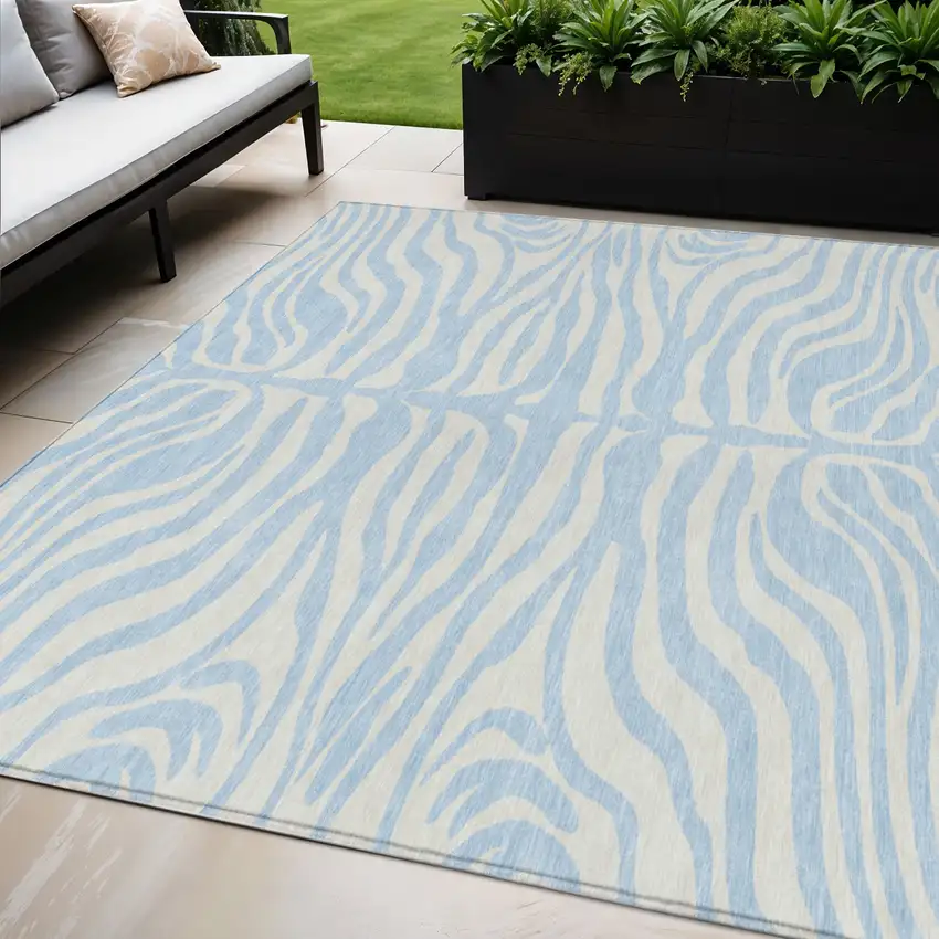 Sky Blue And Ivory Animal Print Washable Indoor Outdoor Area Rug Photo 1
