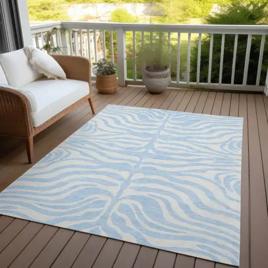 Sky Blue And Ivory Animal Print Washable Indoor Outdoor Area Rug Photo 7