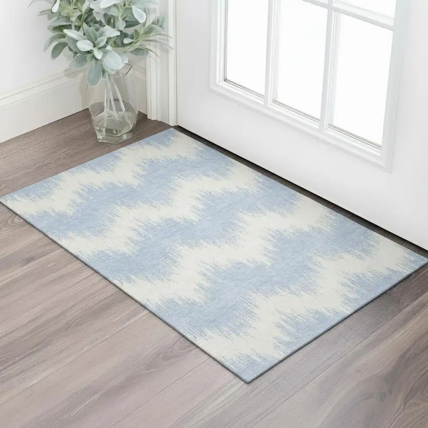 Sky Blue And Ivory Chevron Washable Area Rug With UV Protection Photo 1